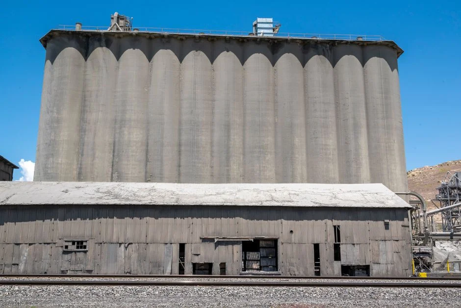 Grain Silo Receiving Rate Optimization: Pit Design and Conveyor Capacity Balance